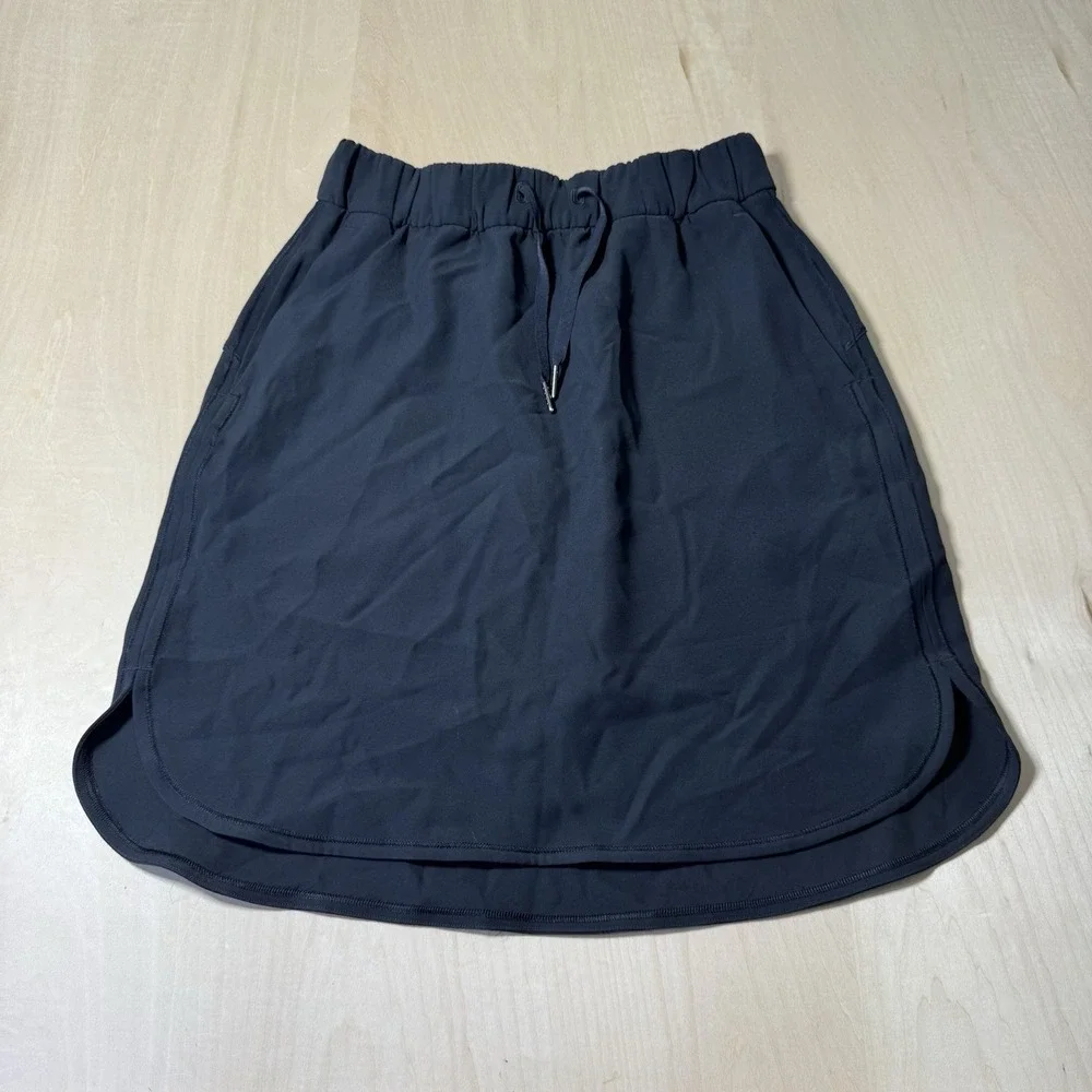Lululemon On The Fly Skirt Woven Solid‎ Black Drawstring Elastic Waist Size 6